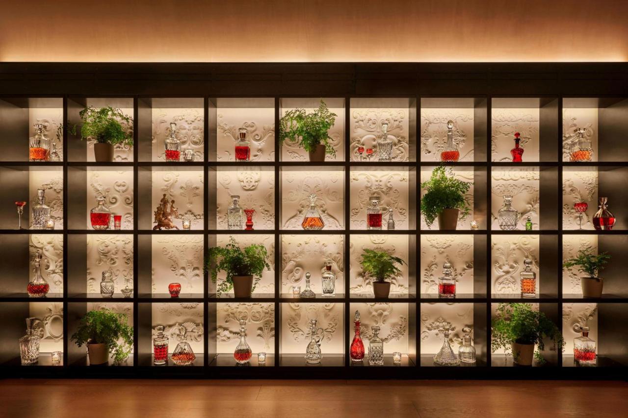 The Times Square Edition Нью-Йорк Екстер'єр фото A display of the world's most famous spirits